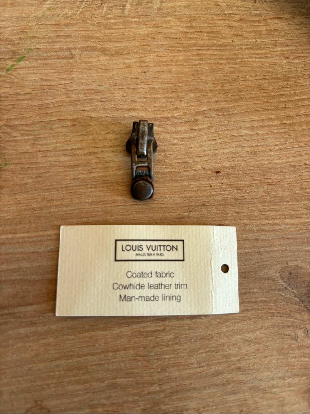 Authentic Louis Vuitton vintage zipper pull